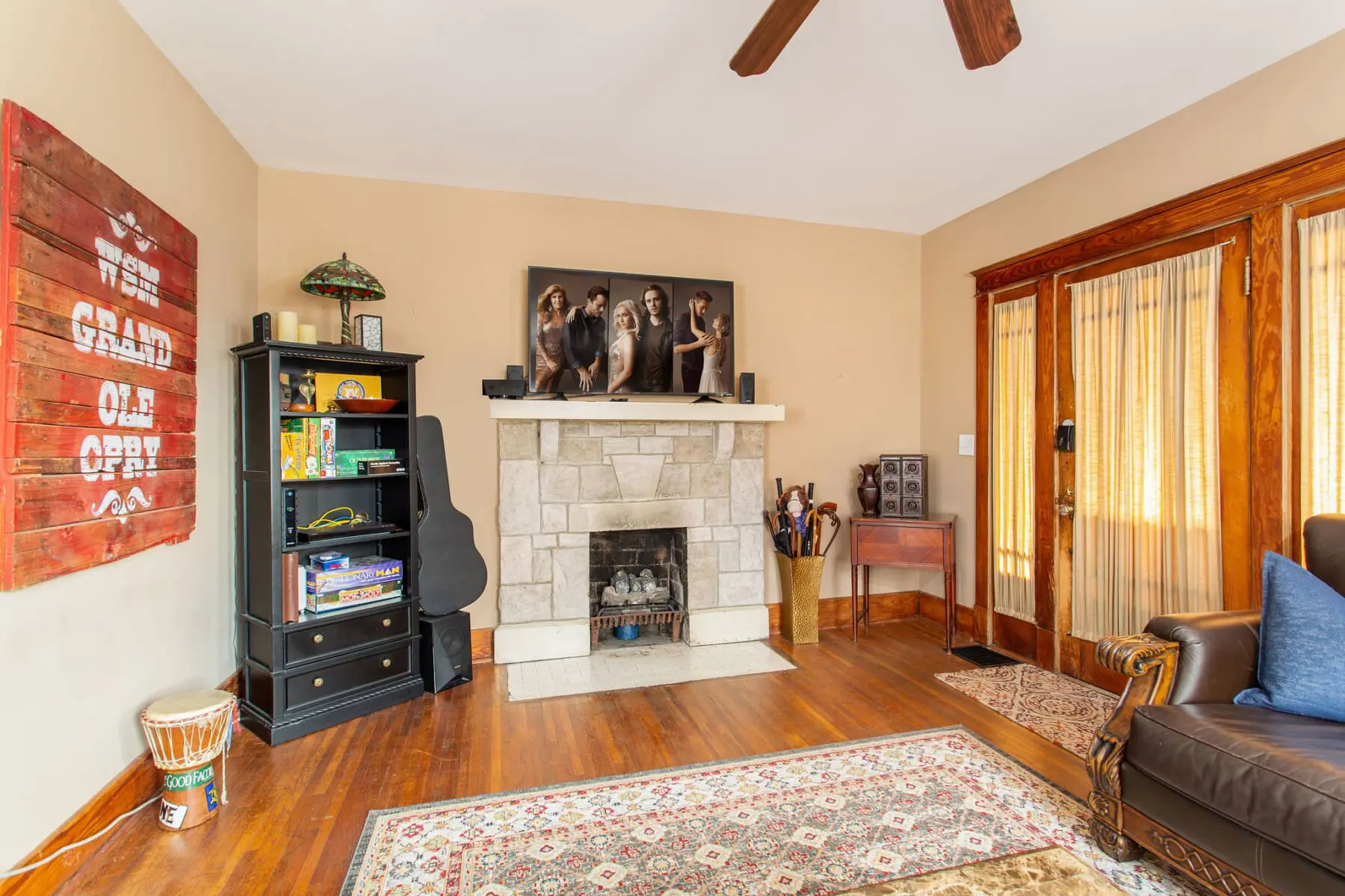 Deacon's House interior — living room with stone fireplace in East Nashville