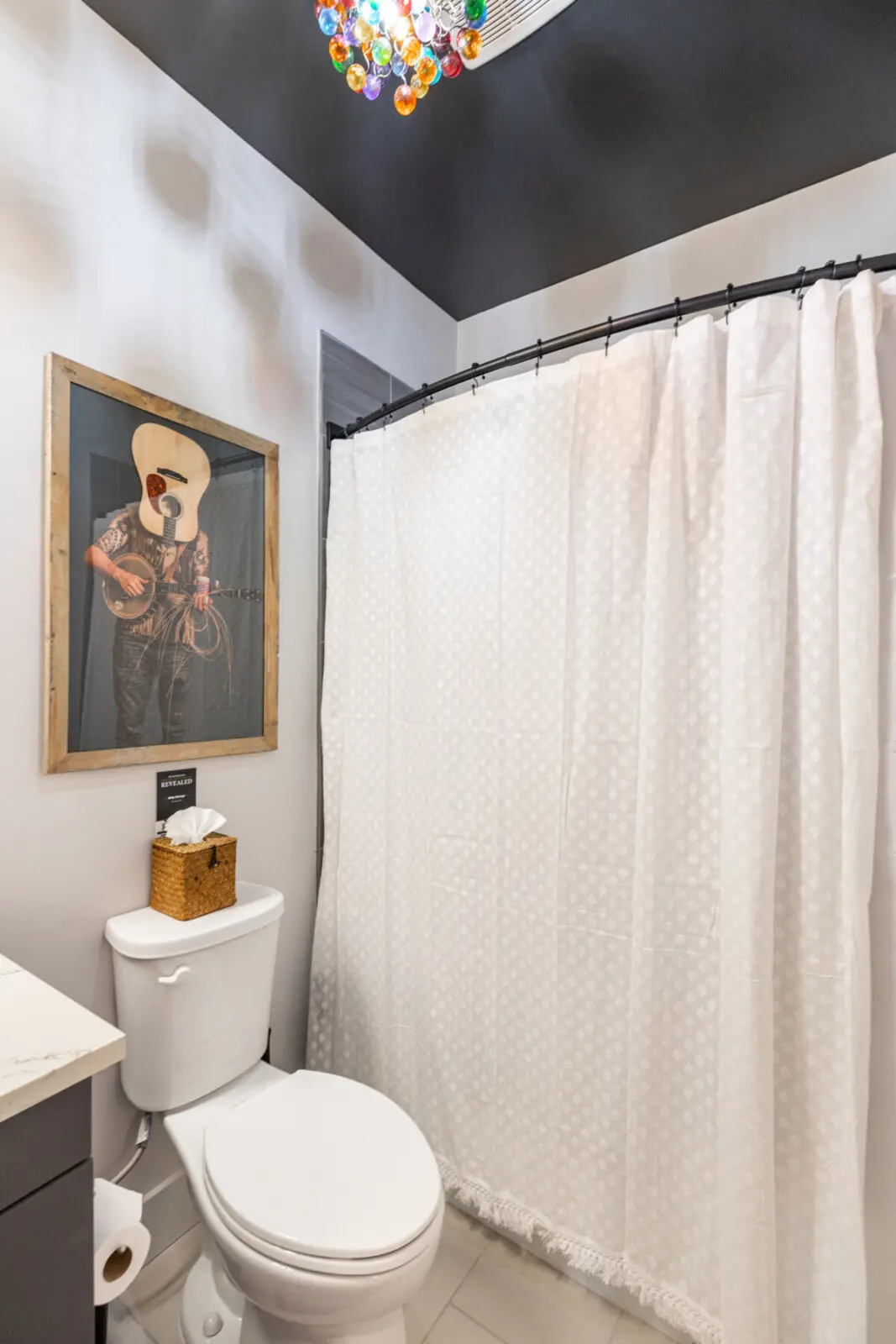 Honky Tonk Party Pad 1 bathroom Billy Strings Weintrob art chandelier Nashville luxury rental Music City Magnolia