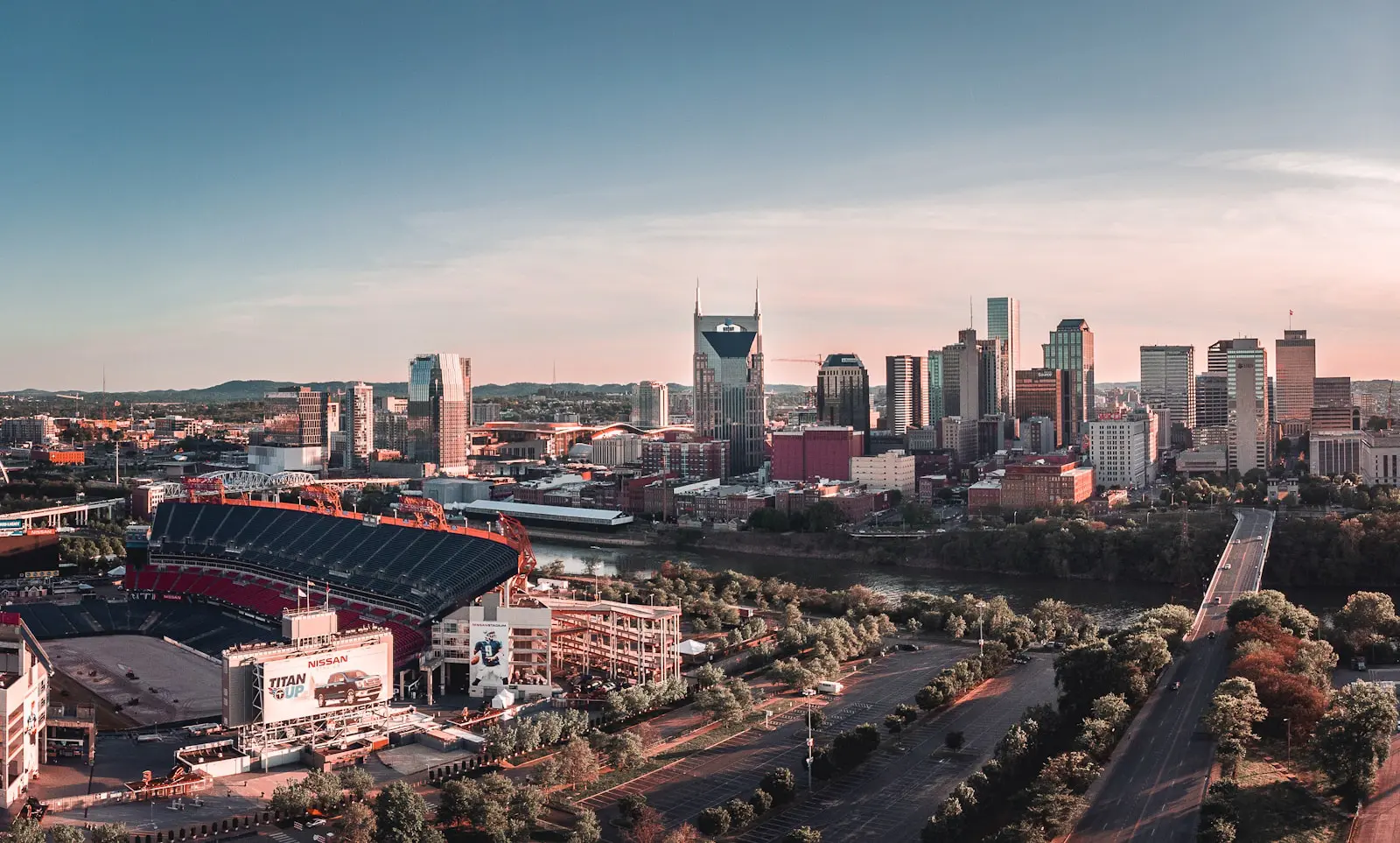 Downtown Nashville skyline along the Cumberland River with Nissan Stadium visible