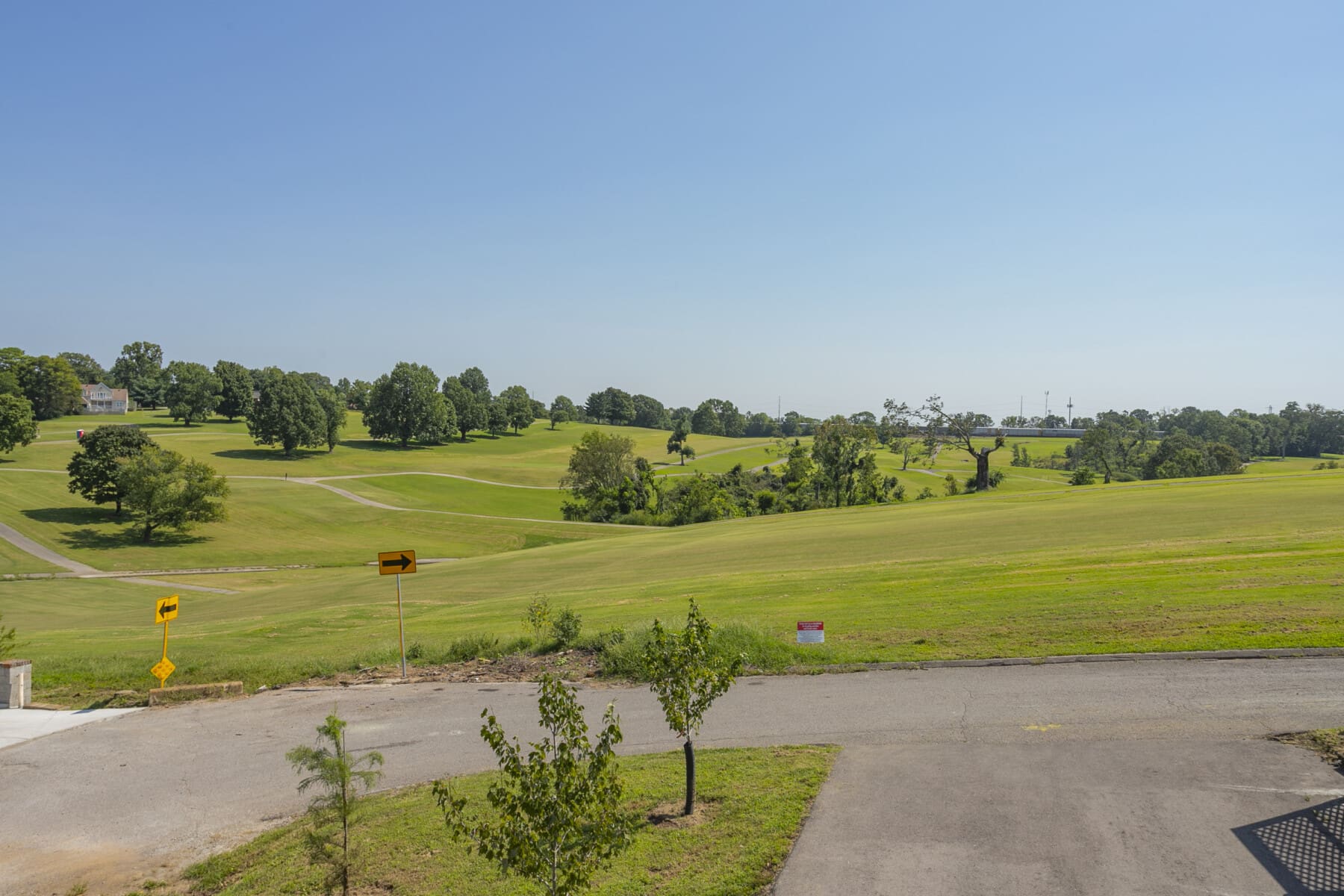 View of Shelby Golf Course rolling fairways from Hydrangea's front yard