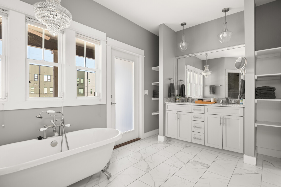 Primary Ensuite Clawfoot Soaking Tub, Plush Linens & Forgot-Its (Upstairs) — Cumberland Retreat, Music City Magnolia East Nashville rental near Nissan Stadium